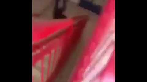 Teen in red sweatshirt jumps down stairs and hits head