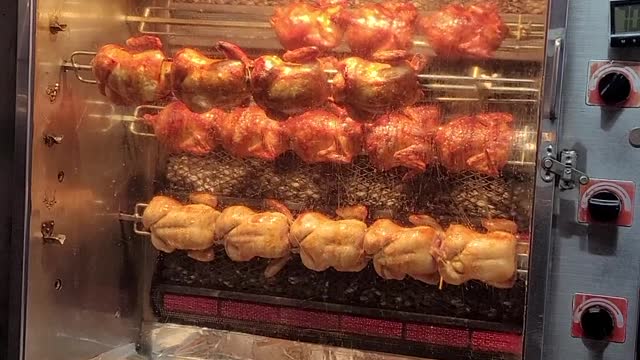 This is a delicious electric grilled whole chicken sold in a truck in front of the house