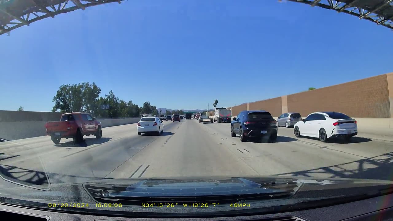 Narrowly Avoiding a Jackknifing Trailer on the Freeway