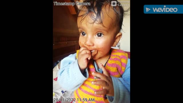 Cute baby celebrating chocolate party