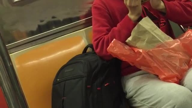 Red shirt man falls in love with crab on subway