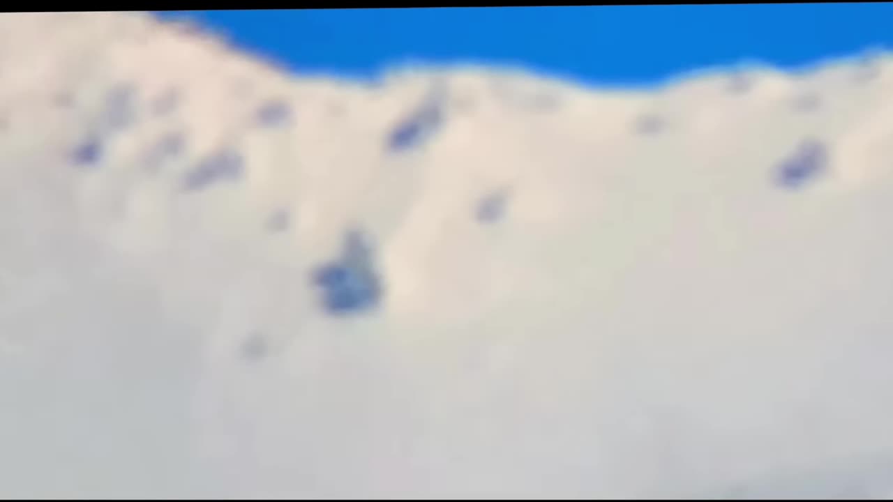 Sasquatch easily glides through deep, steep snow on mountain