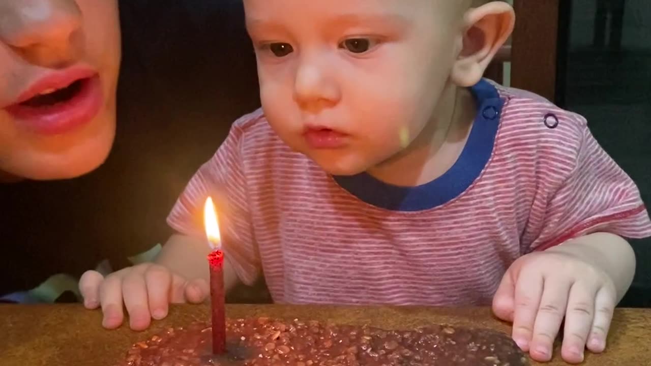 Brother Gets Distracted During Birthday Candle Blow Out