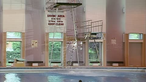 Mr Bean goes swimming and tries to attempt the diving board and doesn`t make it