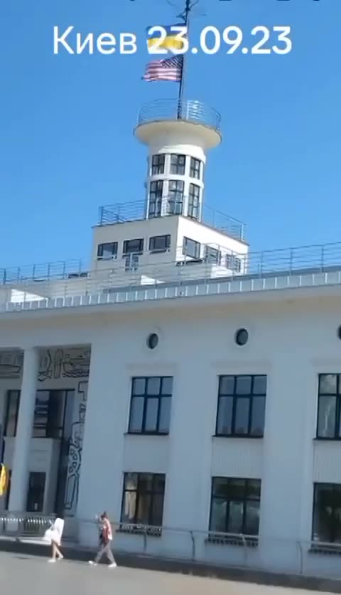 American flag is flying over the governmental river port authority office in Kiev.