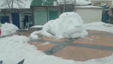 A lion carved in snow in Morocco