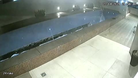 Caught On Camera - Swimming Pool Collapses into Parking Lot