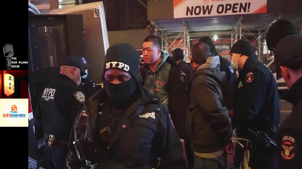 Anti-vax protesters detained after storming AMC theater in Midtown NYC