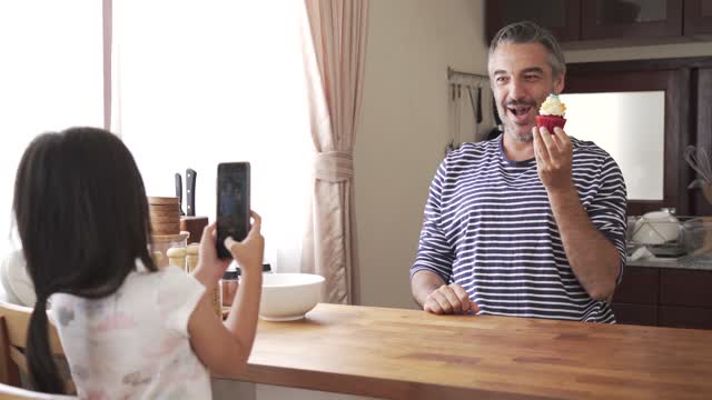 daughter playing with dad