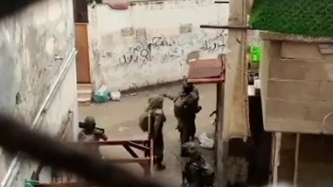 IDF troops scouring neighborhoods in the occupied West Bank