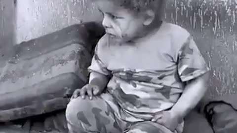 Palestinian child is in shock after the israeli bombarded in gaza