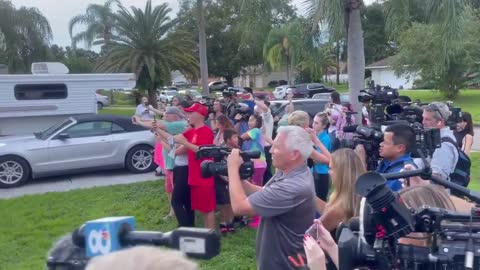 A crowd outside Brian Laundrie's home chants "Where is Gabby?"