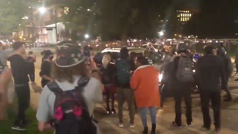 Protesters in Denver block the street