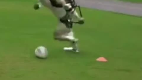 Robot playing football