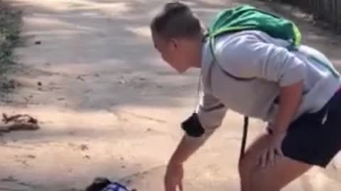 Dude Helps Puppy Who Was Too Deep in Snack Bag