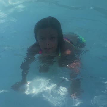 Swimming in the pool 🏊‍♀️