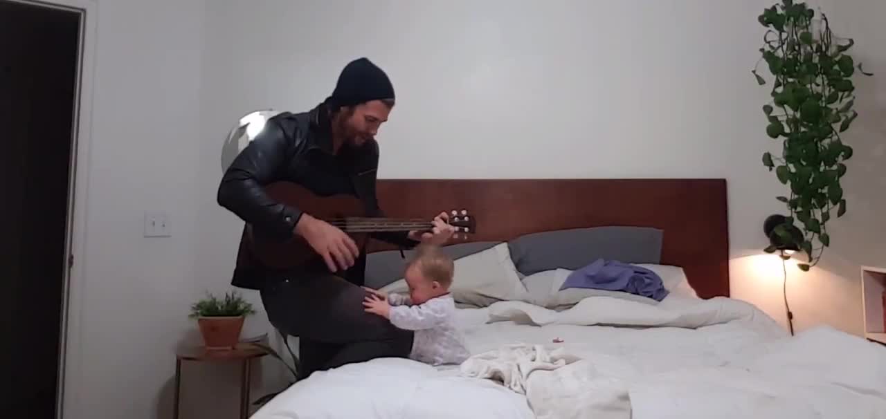 Baby Girl Is Number One Fan Of Dad And His Guitar