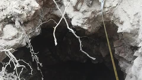 Exposed a vertical cave while building a road