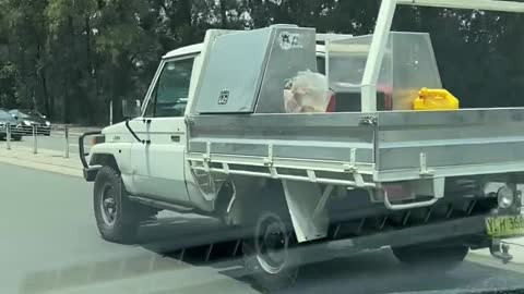 Man Hangs By Truck's Bull Bar for Kilometers