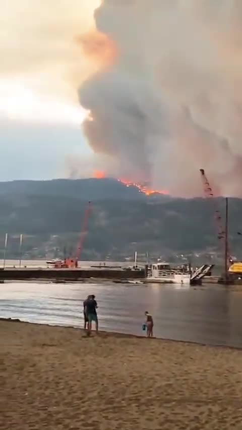 The people look on helplessly as Canada is the latest to burn