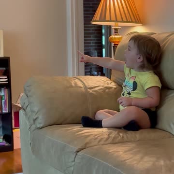 This is what our toddler does when watching a movie. 🤣