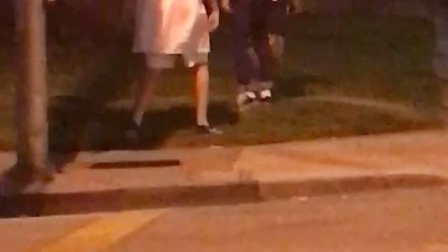 Guy white shirt falling down in lawn