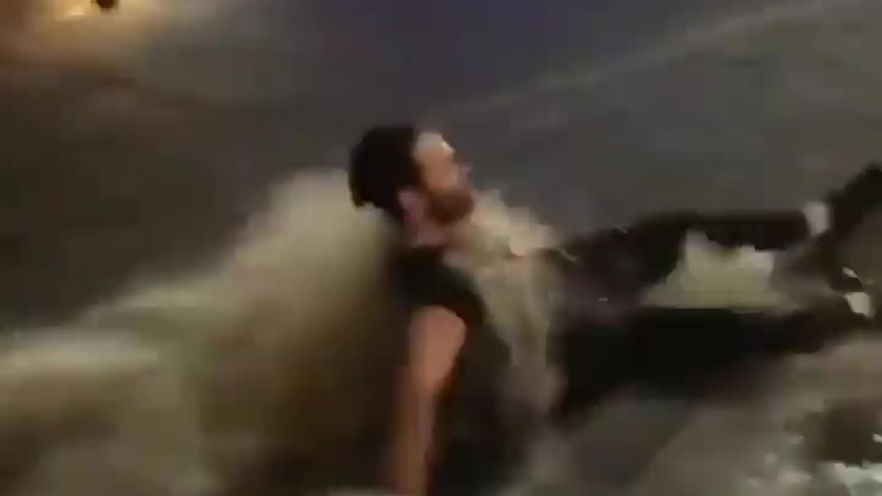 Many Ls Taken Man Falls Into Flooded Gutter After Getting Punched