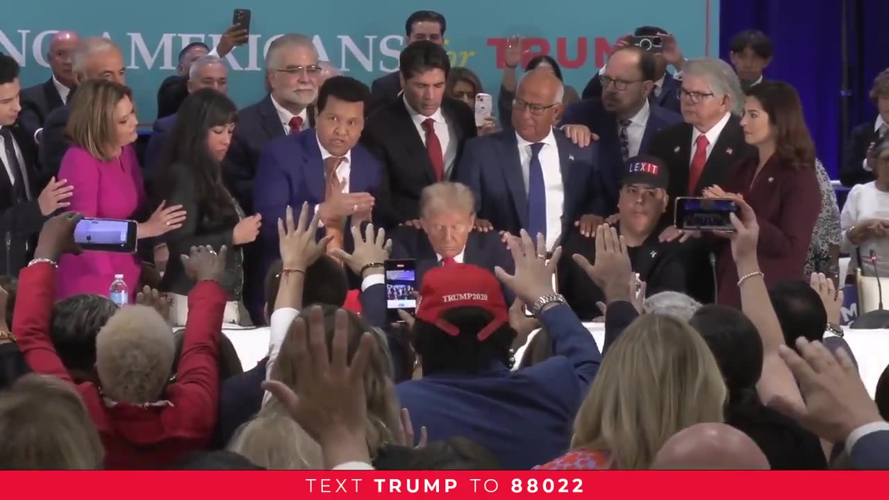 Latino voters and industry leaders pray over President Trump after their town hall. 🙏