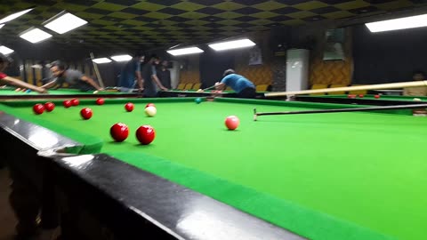 Playing Snooker