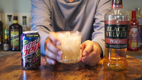 Black Velvet Peach Whiskey & Mtn Dew Voo Dew Mystery Flavor 2023
