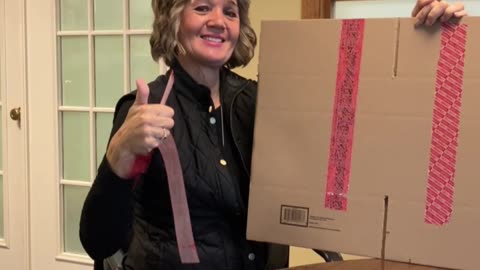 Testing New Tamper Proof Tape for boxes of completed ballots