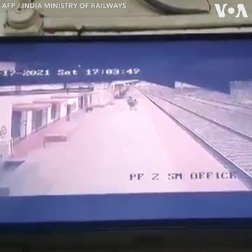 Indian 'superhero' rescue young boy from train.