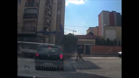 Kosovo driver ignores stop sign