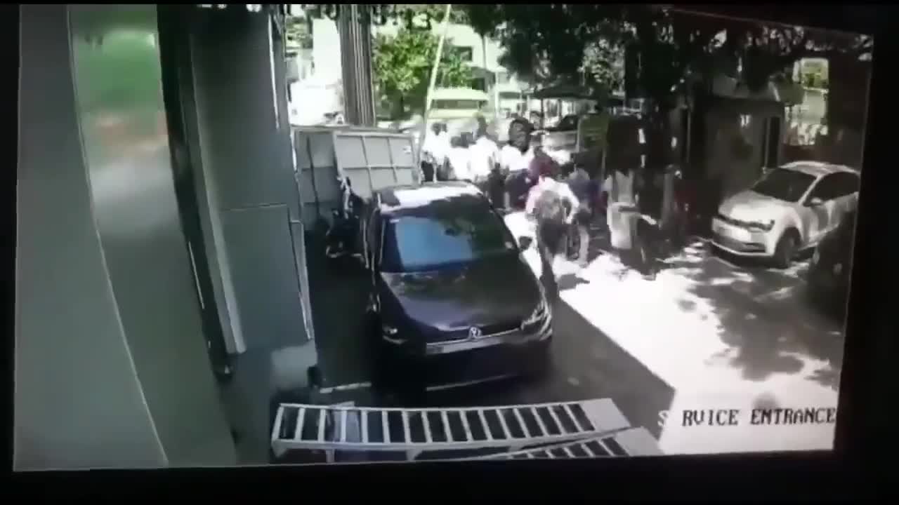 The buyer of a brand new car overturns it on the roof before leaving the parking lot