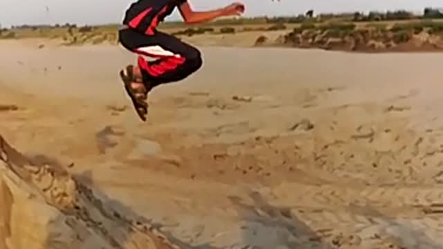 Playing and Jumping on sand