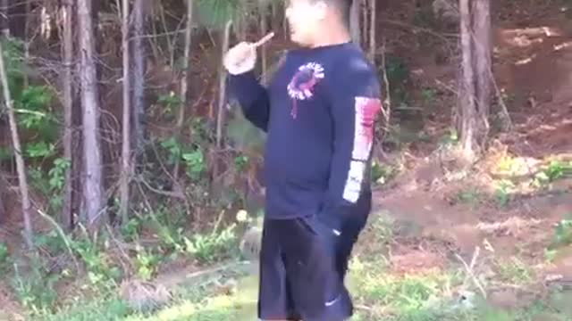 Red sweater kid runs out of woods and falls on face