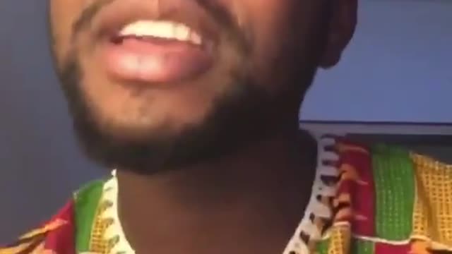 African boy singing for unification of Africa