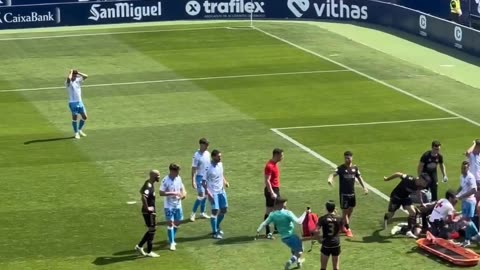 Football Player Races Paramedic Bag Across Pitch