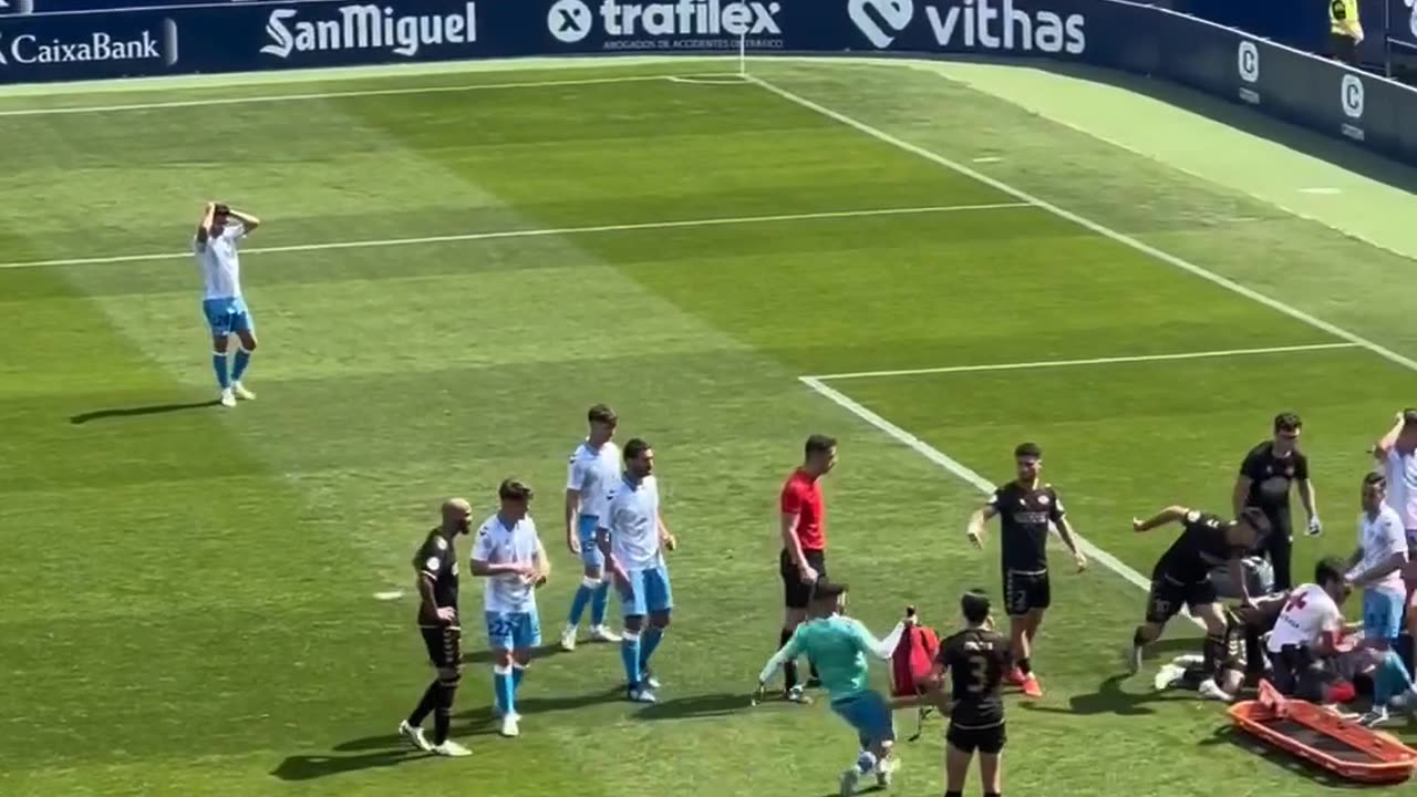 Football Player Races Paramedic Bag Across Pitch