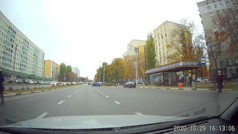 Cars Slams on Breaks to Avoid Woman Crossing Road