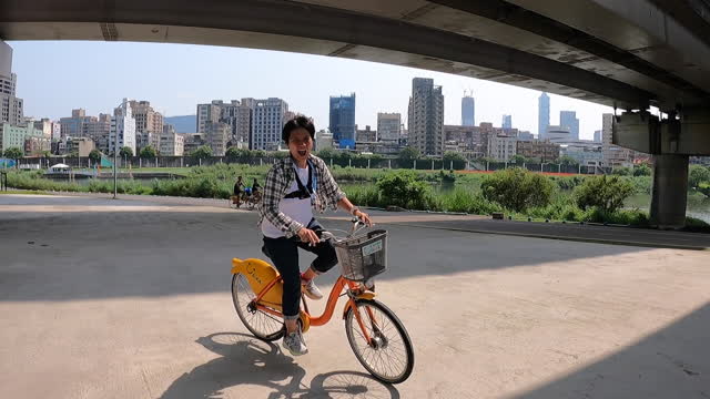 Standing and riding a bicycle