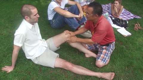 Luodong Gives Heat To White Man's Knees At The Park