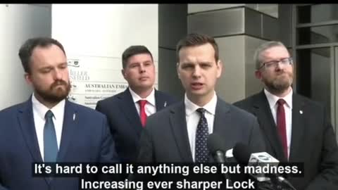 Polish deputies protest in front of the Australian Embassy