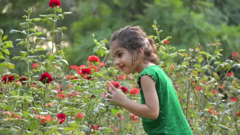 Girl feels flowers playing