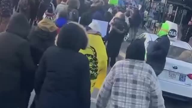 Boston yesterday. Antivax protest