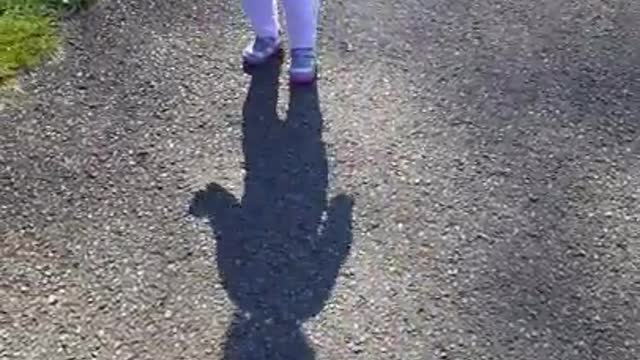 Baby terrified of her own shadow