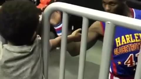 He took extra time to give this Little Fan a high five