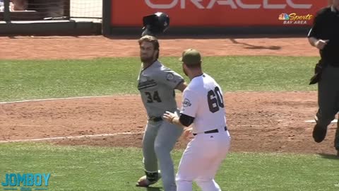 Bryce Harper and Hunter Strickland throw punches at each other, baseball match