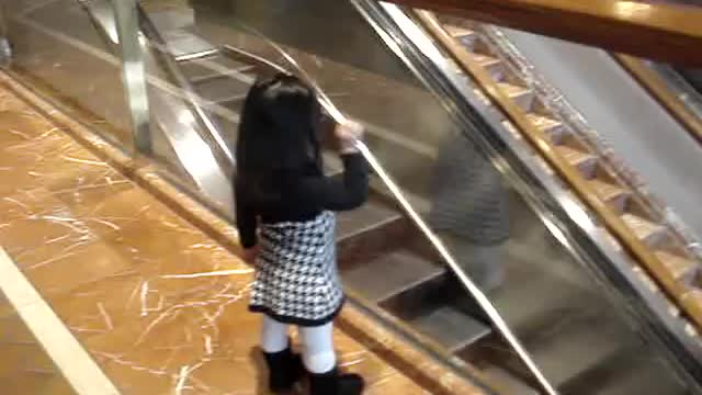 Chloe saying "bye" at the Copley Place Mall