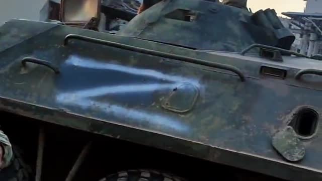 DNR using an APC to evacuate civilians trapped in Mariupol